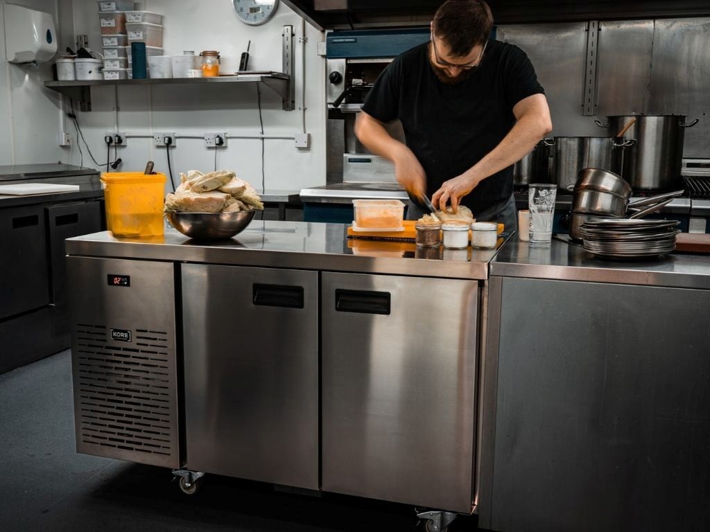 Chef using Foster Gamko equipment