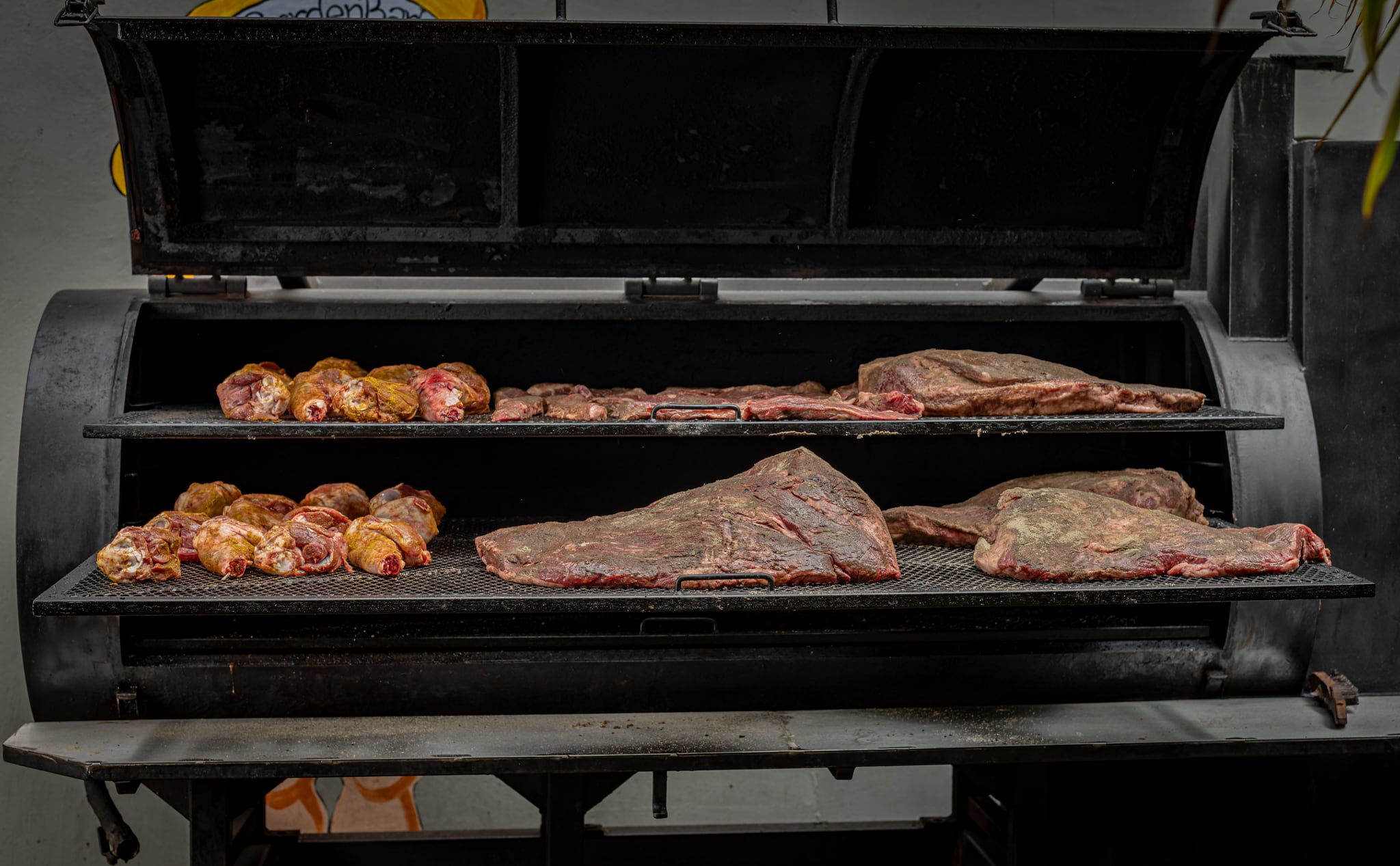 Meat being cooked at Cue Point