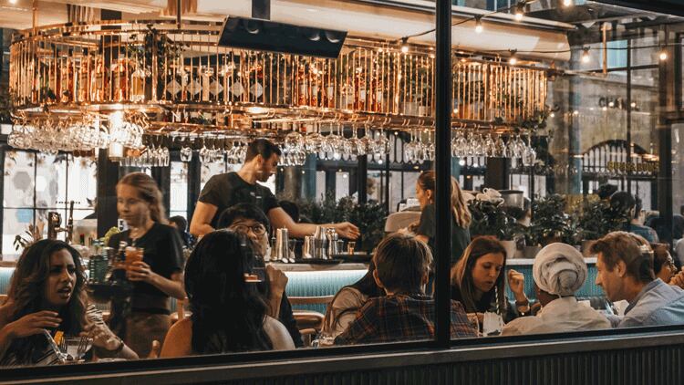 Restaurant groups enjoy sales boost as wet weather dampens growth for pubs and bars