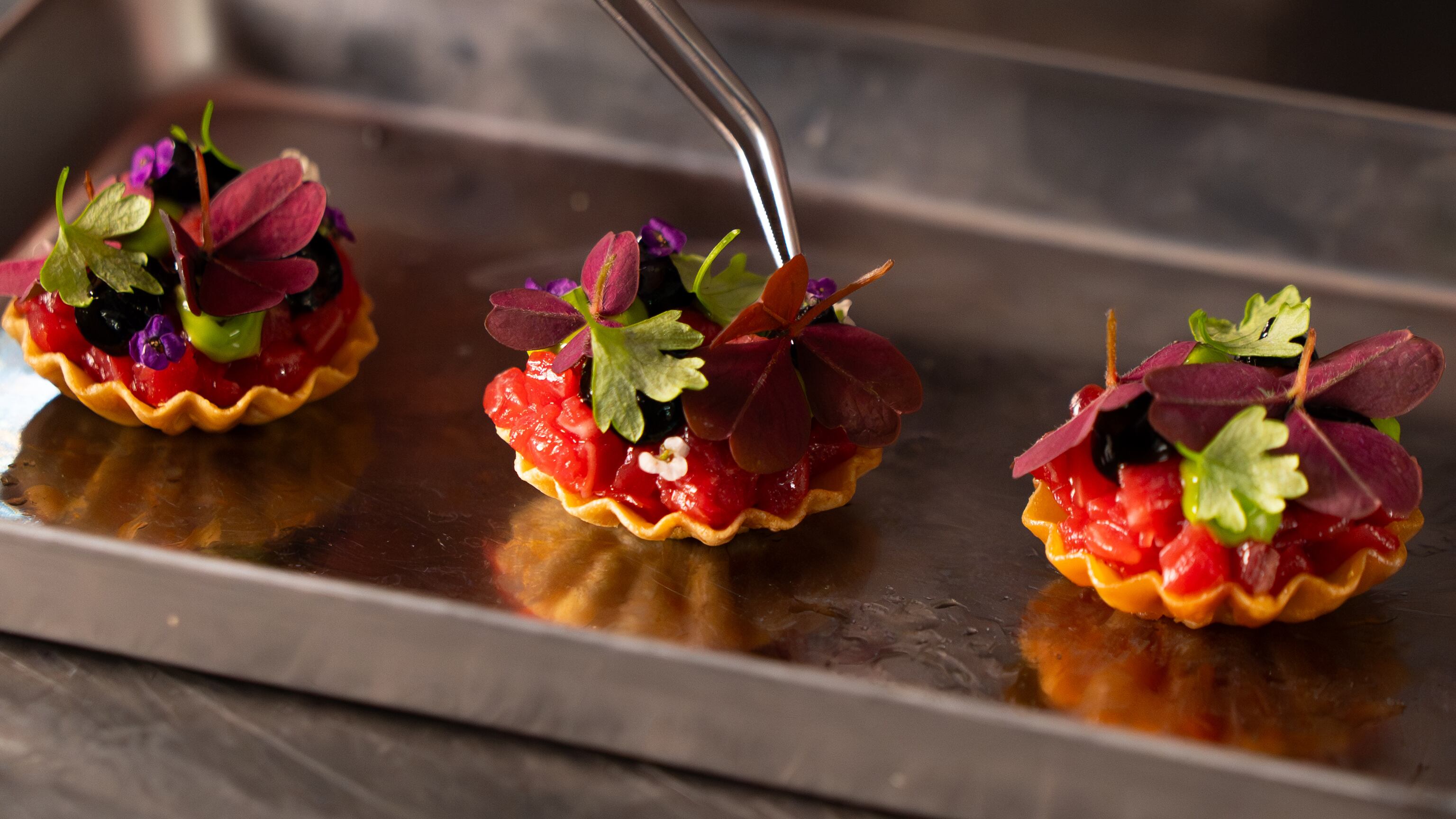 Dry-aged loin of beef with coal oil, black garlic and tarragon