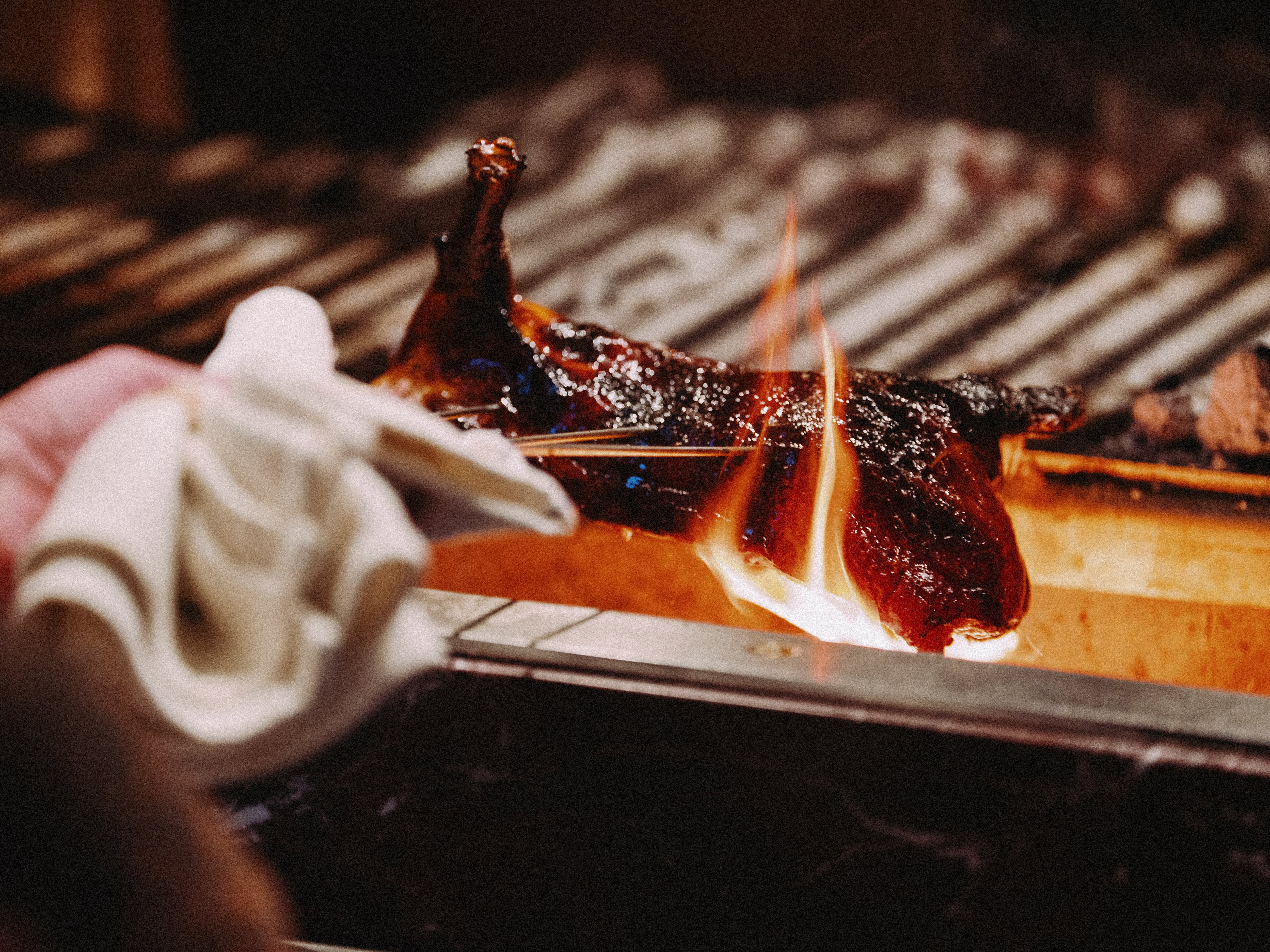 Ducks roasted on a grill at Impala