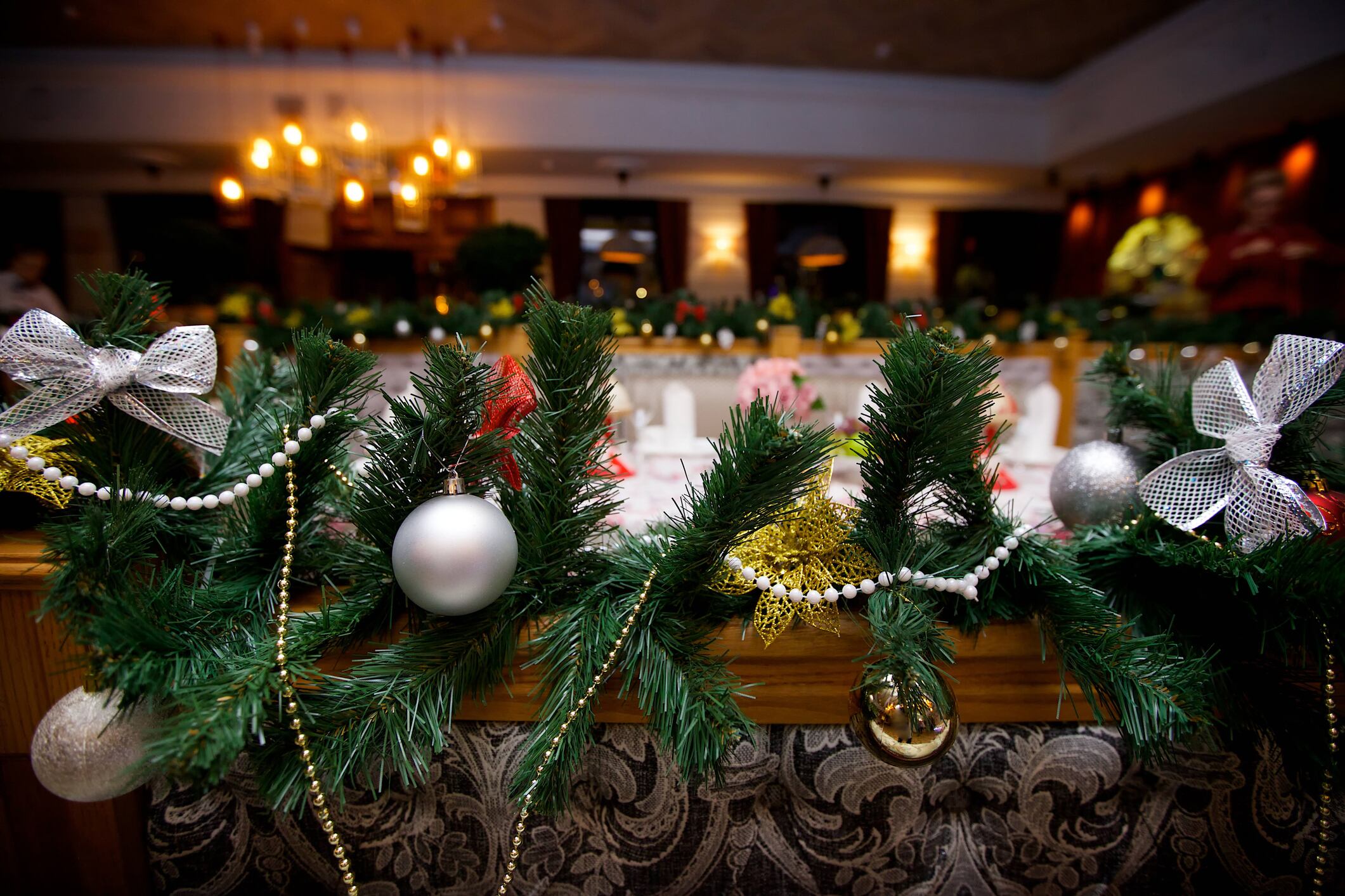 Elegant decorated with balls and figures Christmas tree with a beautiful design.