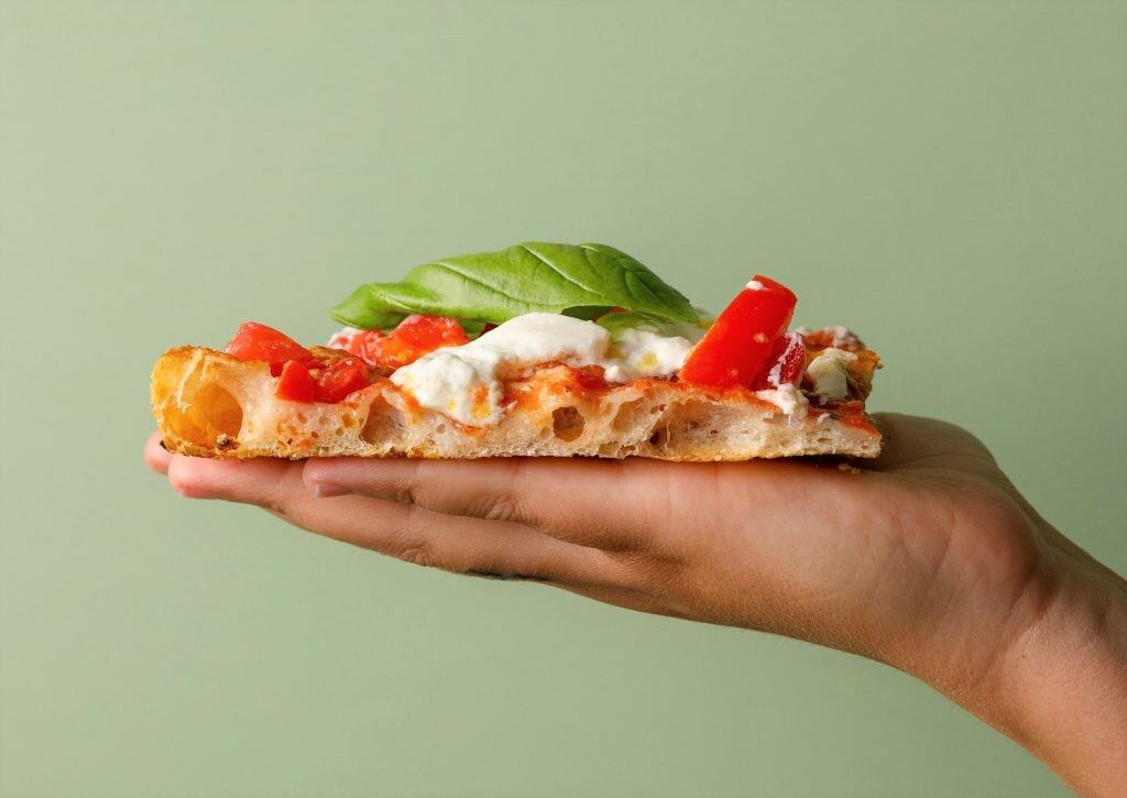 A slice of pizza from Alice Pizza