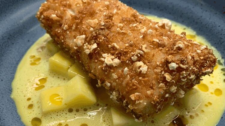 Downtime development: chicken skin crusted Norwegian haddock, curry sauce and mango 