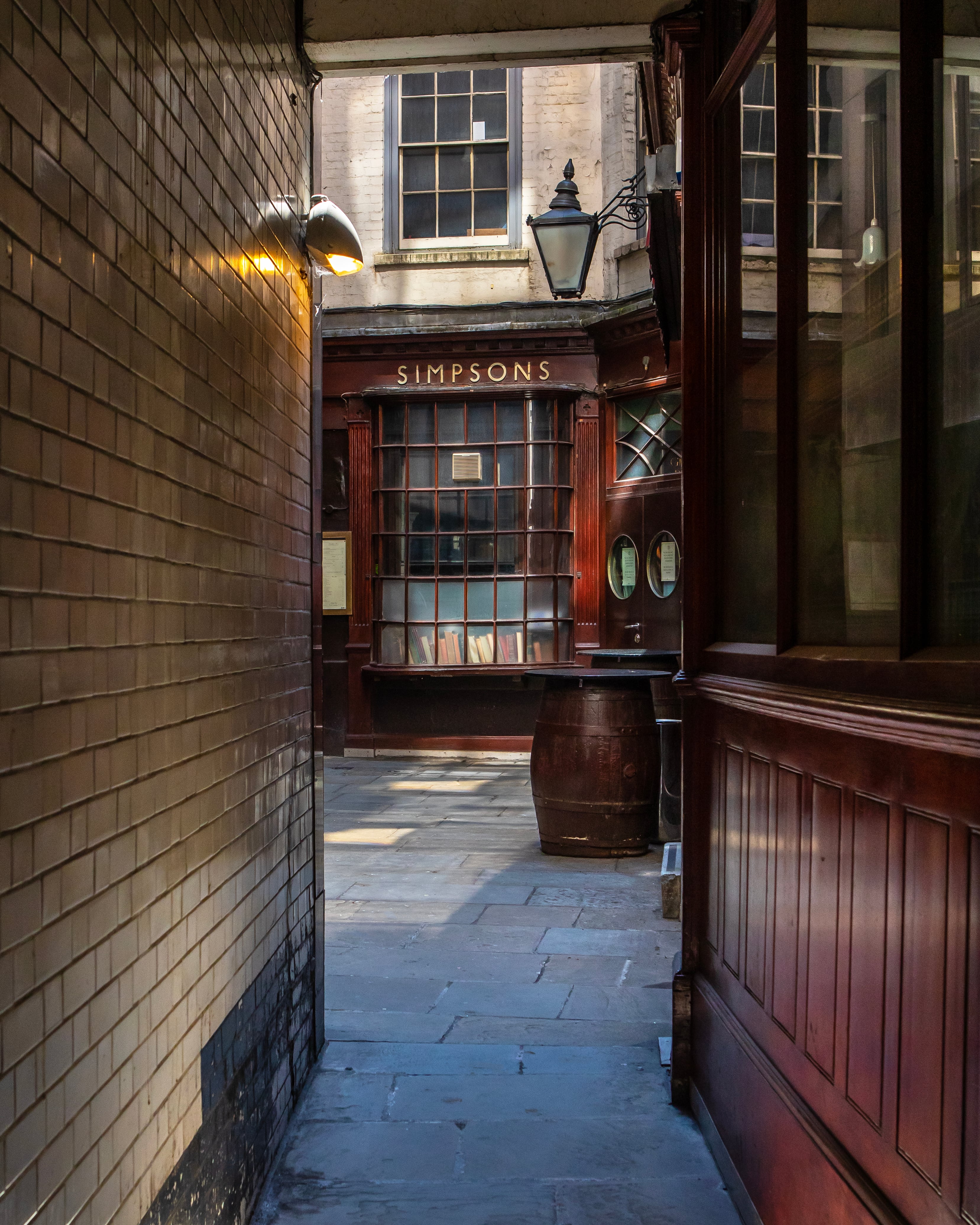 London, UK - April 17th 2023: Exterior of the historic Simpsons Tavern, located on Ball Court, just off of Cornhill in the City of London - it is said to be the oldest chophouse in London.