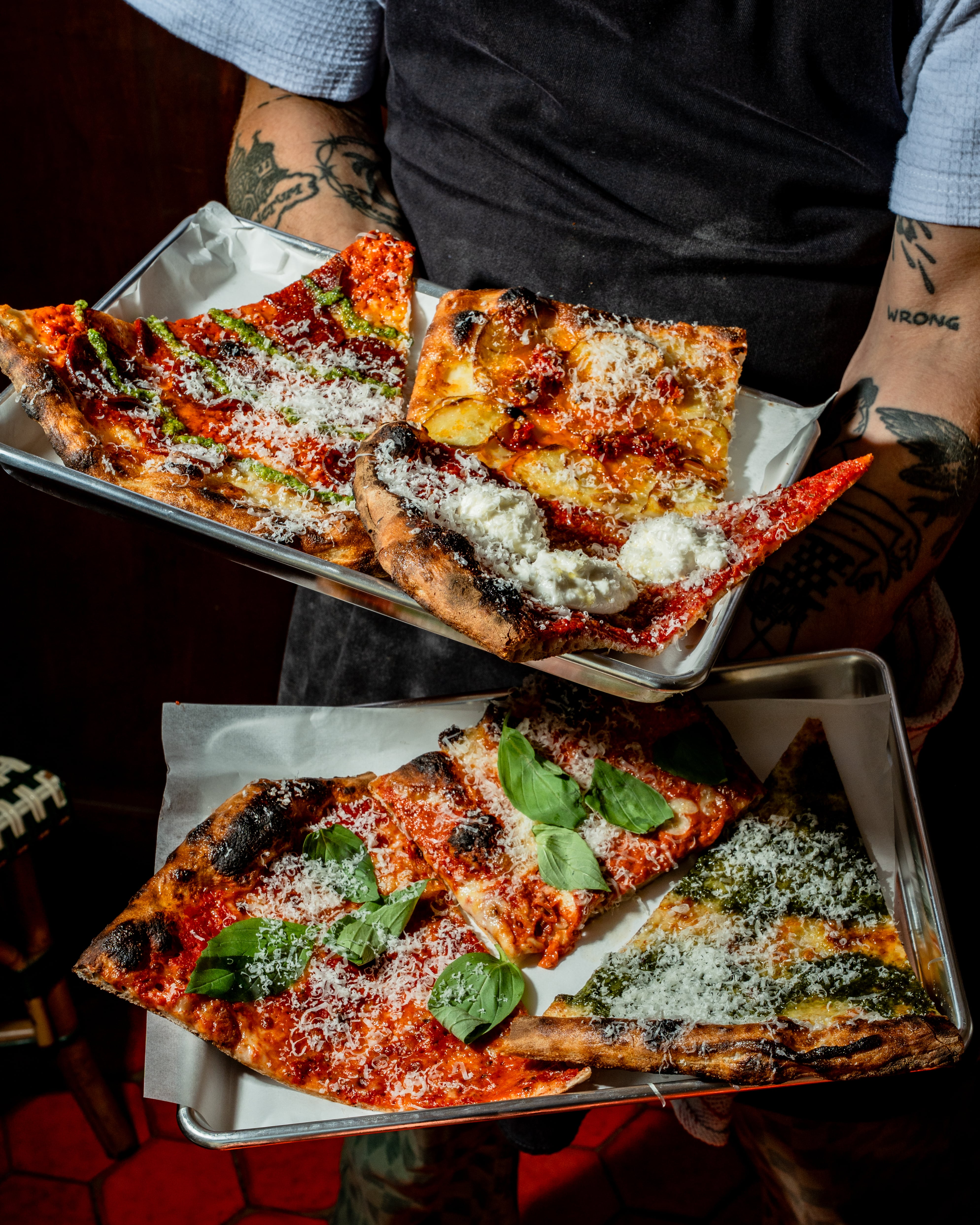 A slice of pizza at Vincenzo's