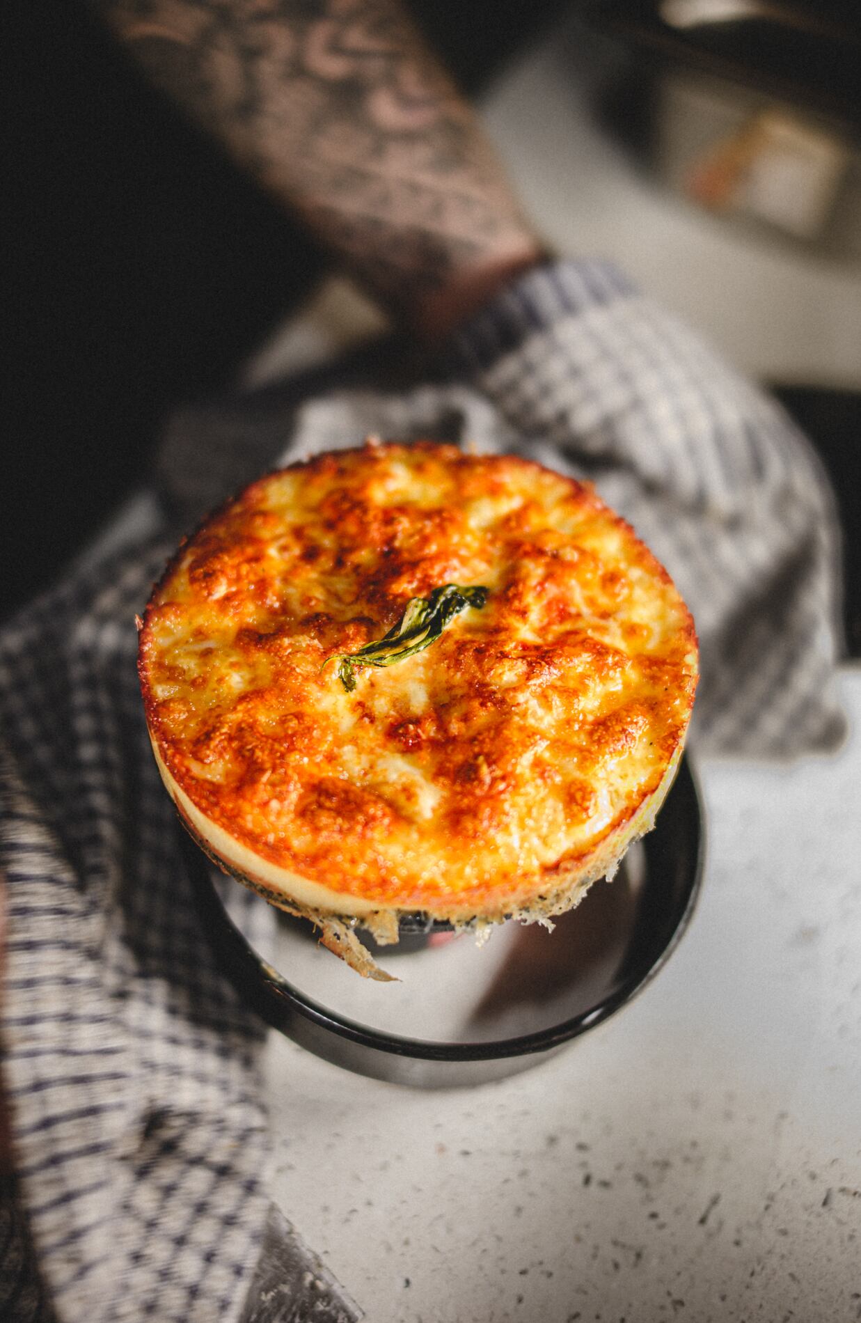 A deep dish pizzas from Little Earthquakes