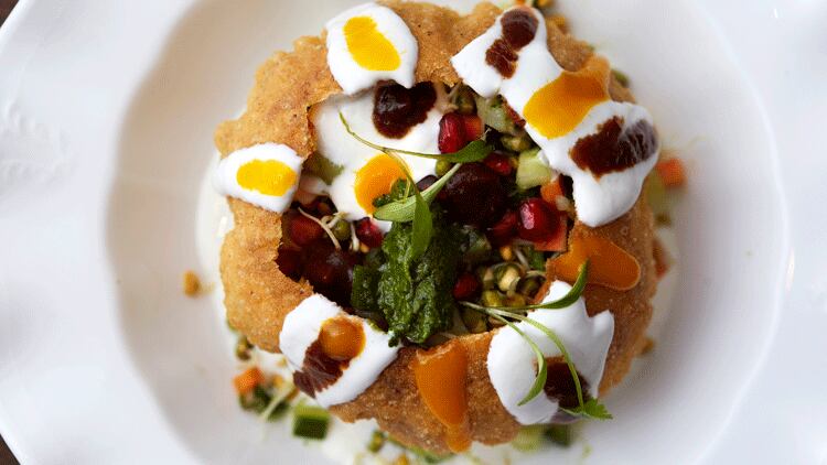 Raj-Kachori-crisp-pastry-shell-filled-with-sprouted-mung-fenugreek-pickled-kachumber-and-spiced-yoghurt-v-close-up.png