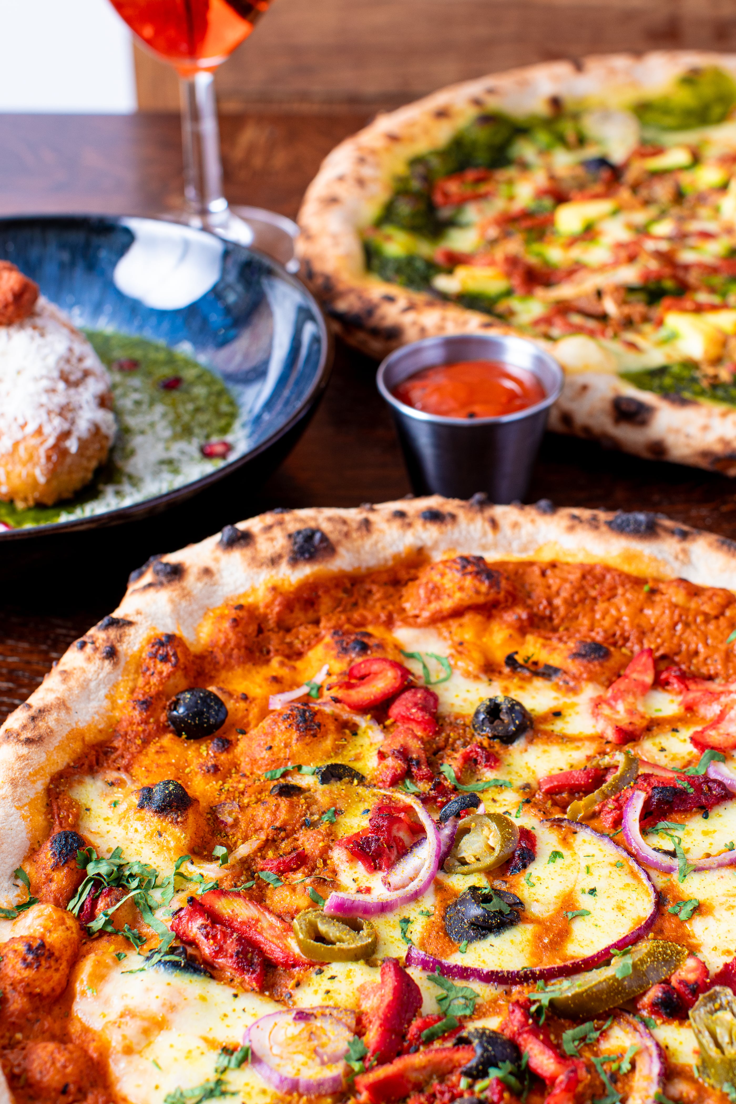 Indian fusion pizzas at East West