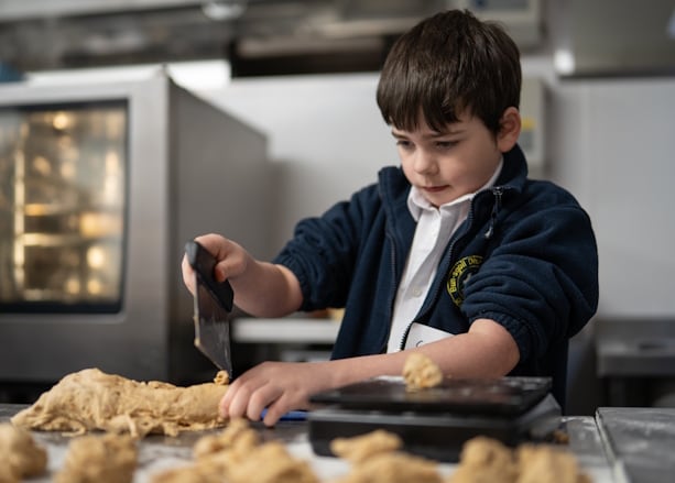 Junior chef programme participant in the kitchen