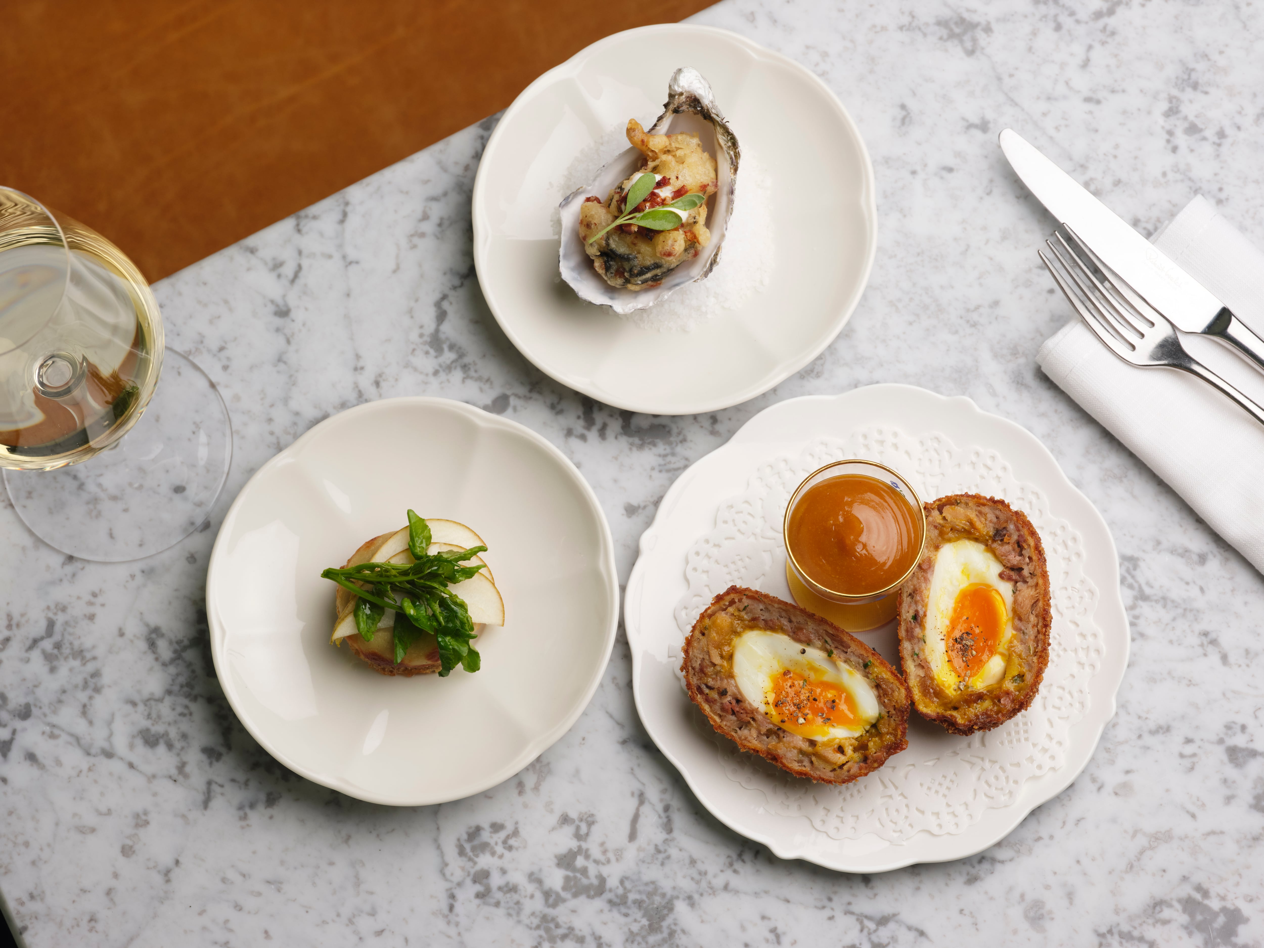 Scotch egg and oyster at Teal by Sally Abe