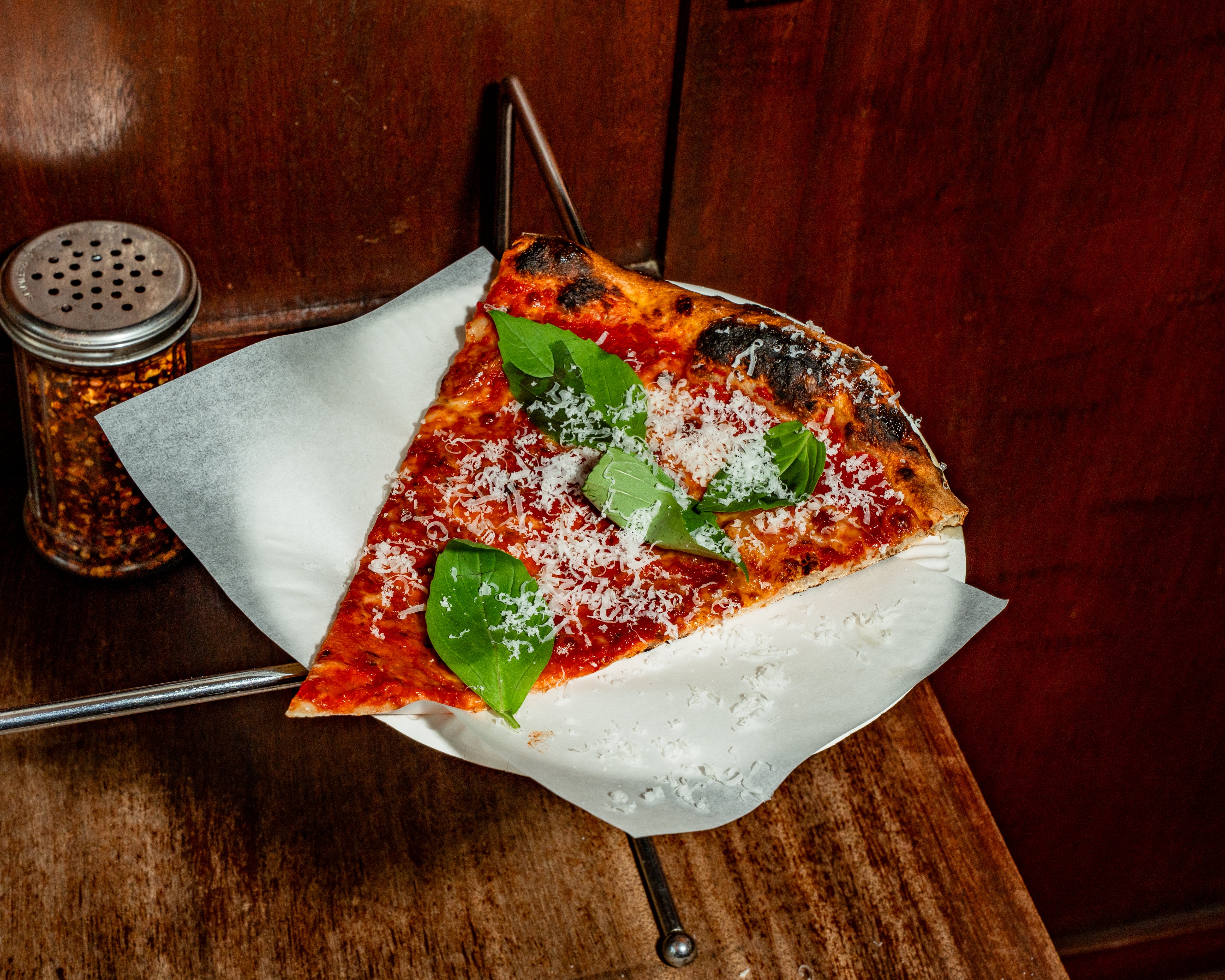 A slice of pizza at Vincenzo's