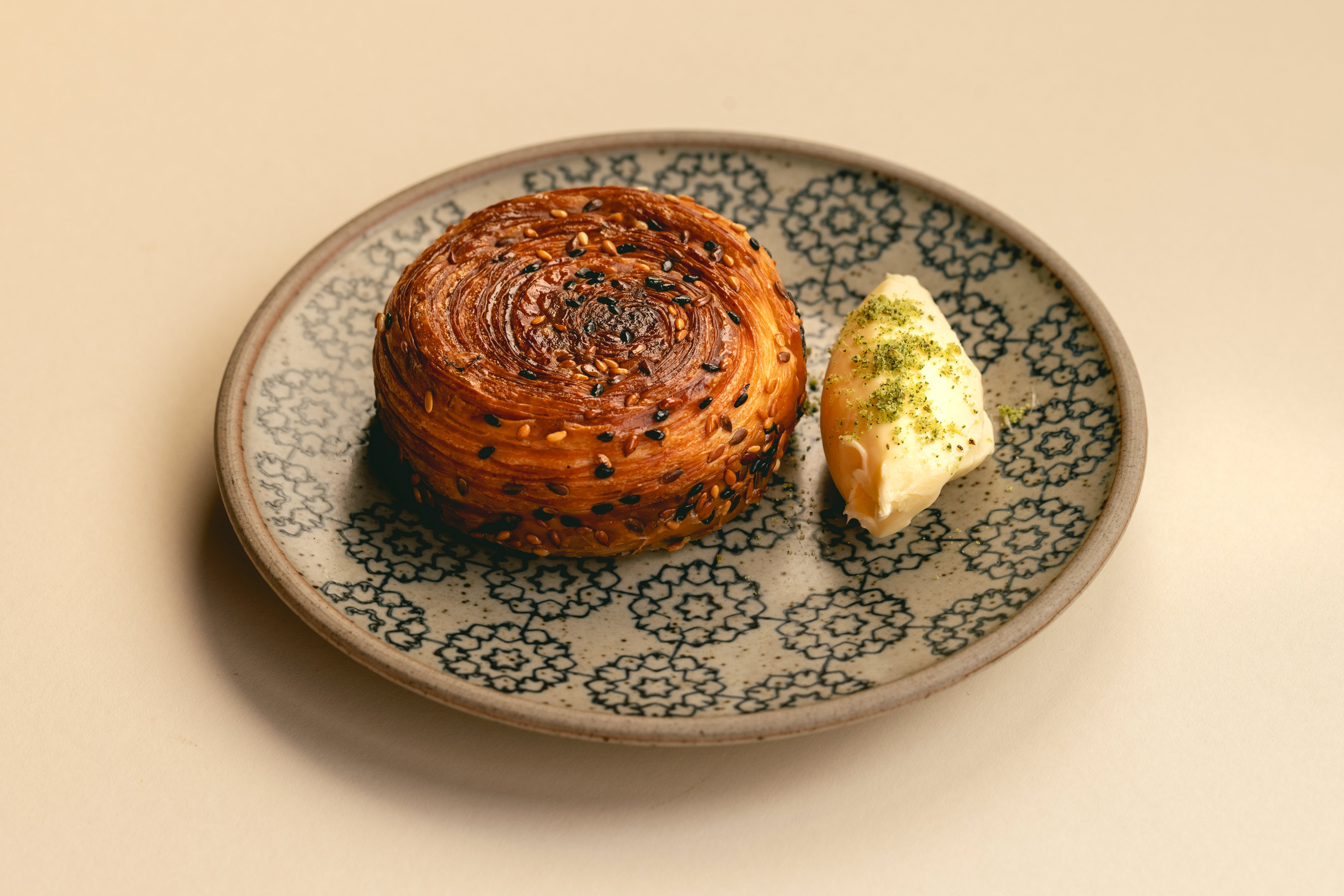 Sesame cruffin with salted date butter