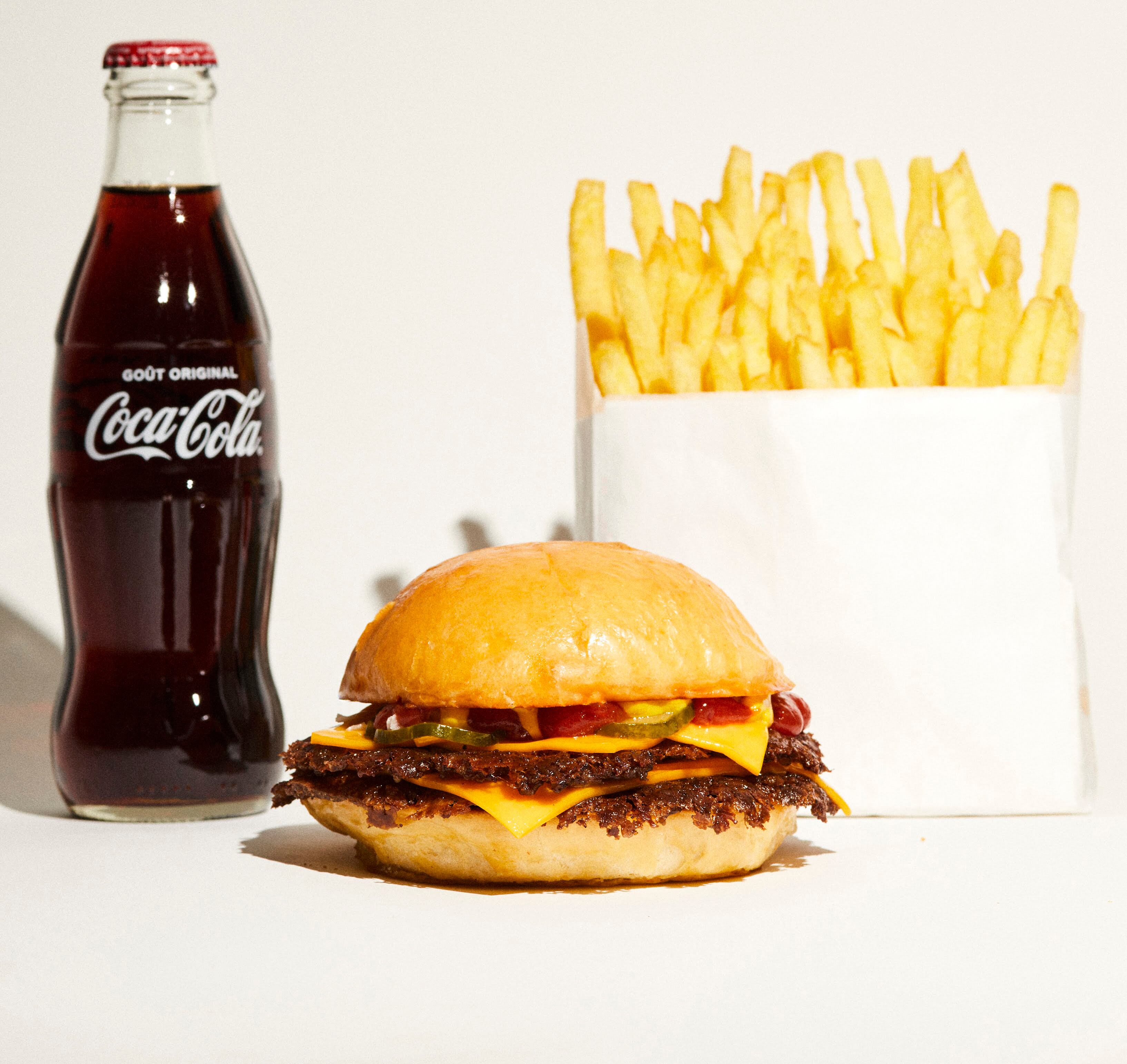 A smash burger, coke and fries from Dumbo