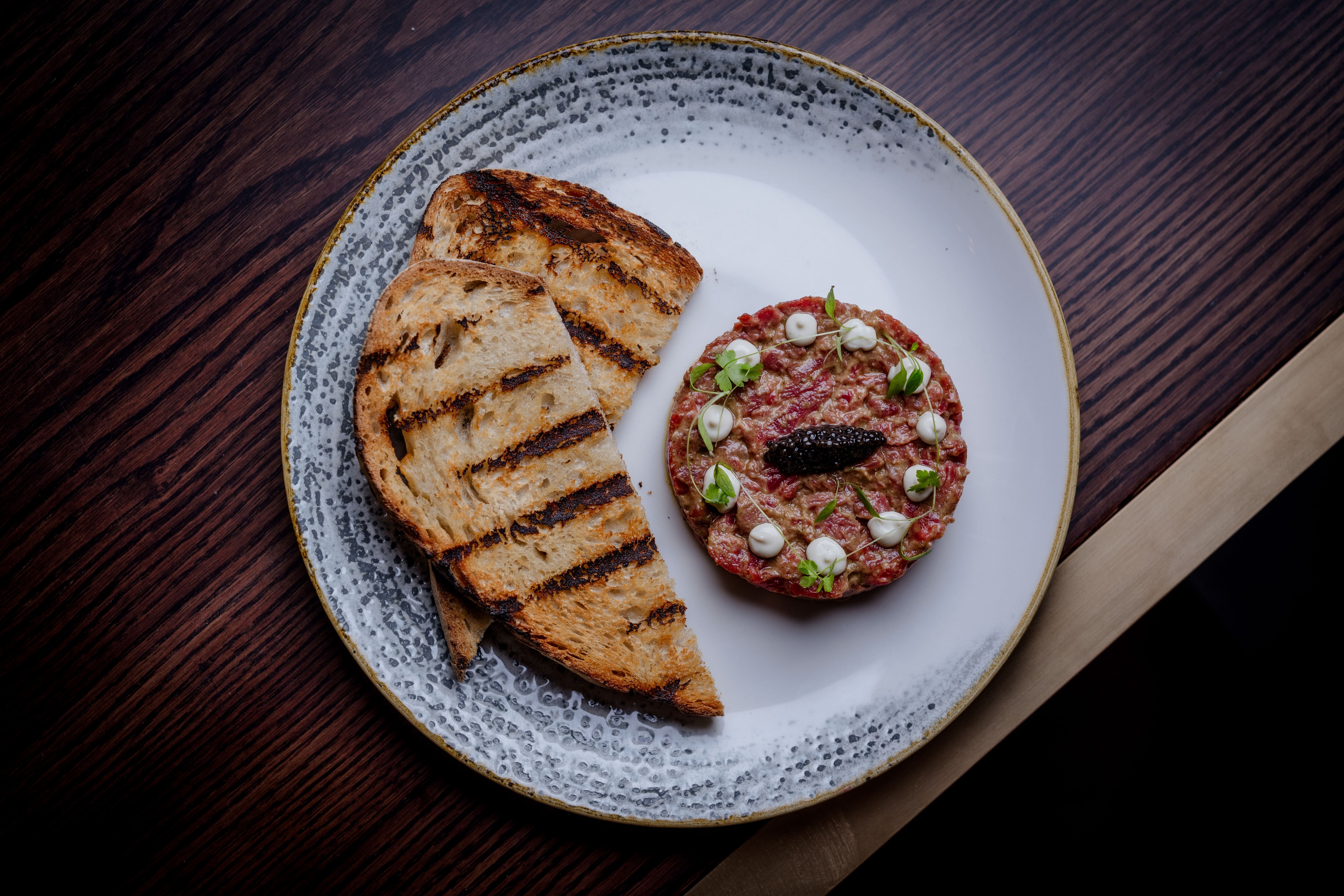 Restaurant group Pearly Cow's signature dish of beef tartare with caviar, oyster cream and charred sourdough