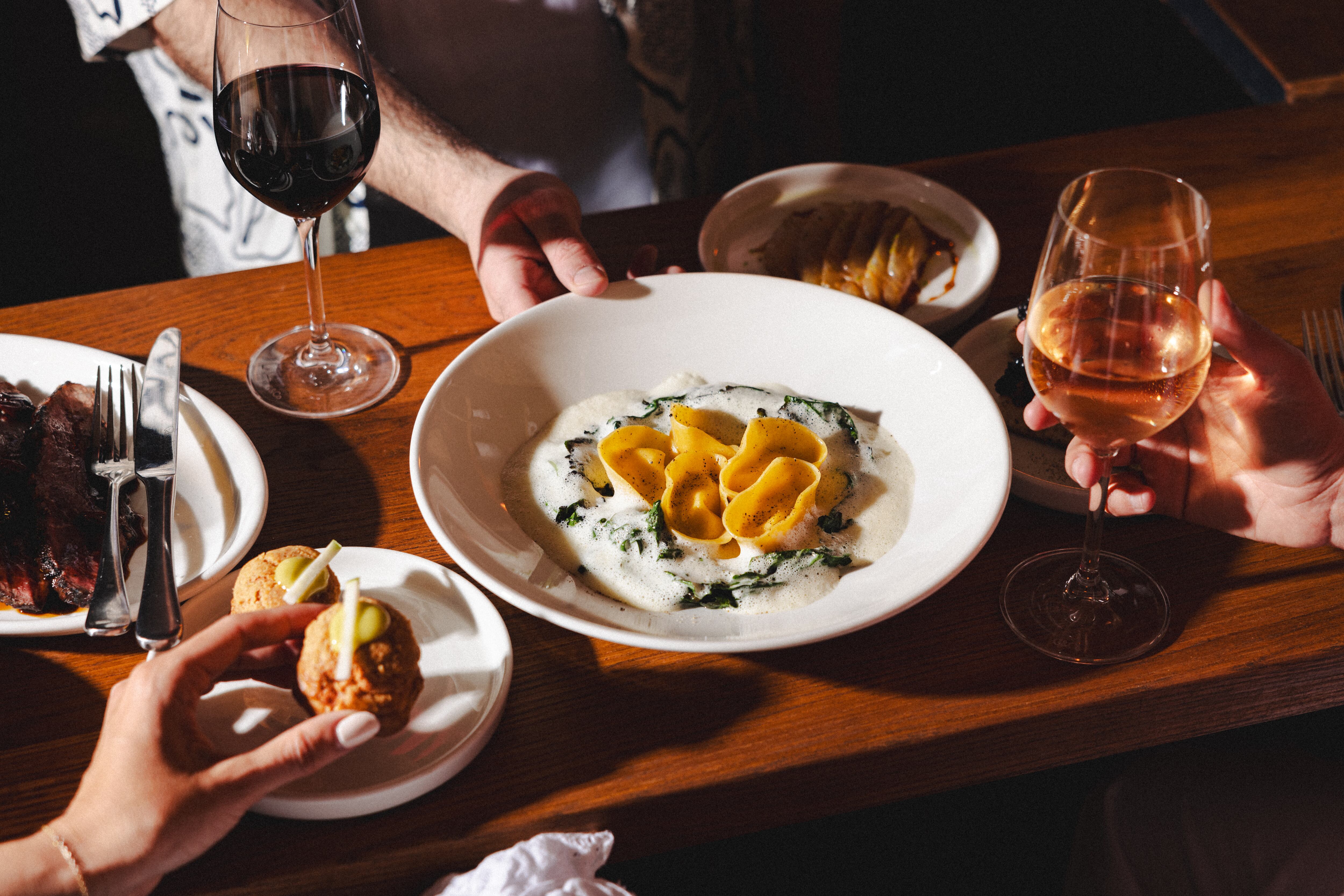 A table of food at Boxcar Fire & Wine