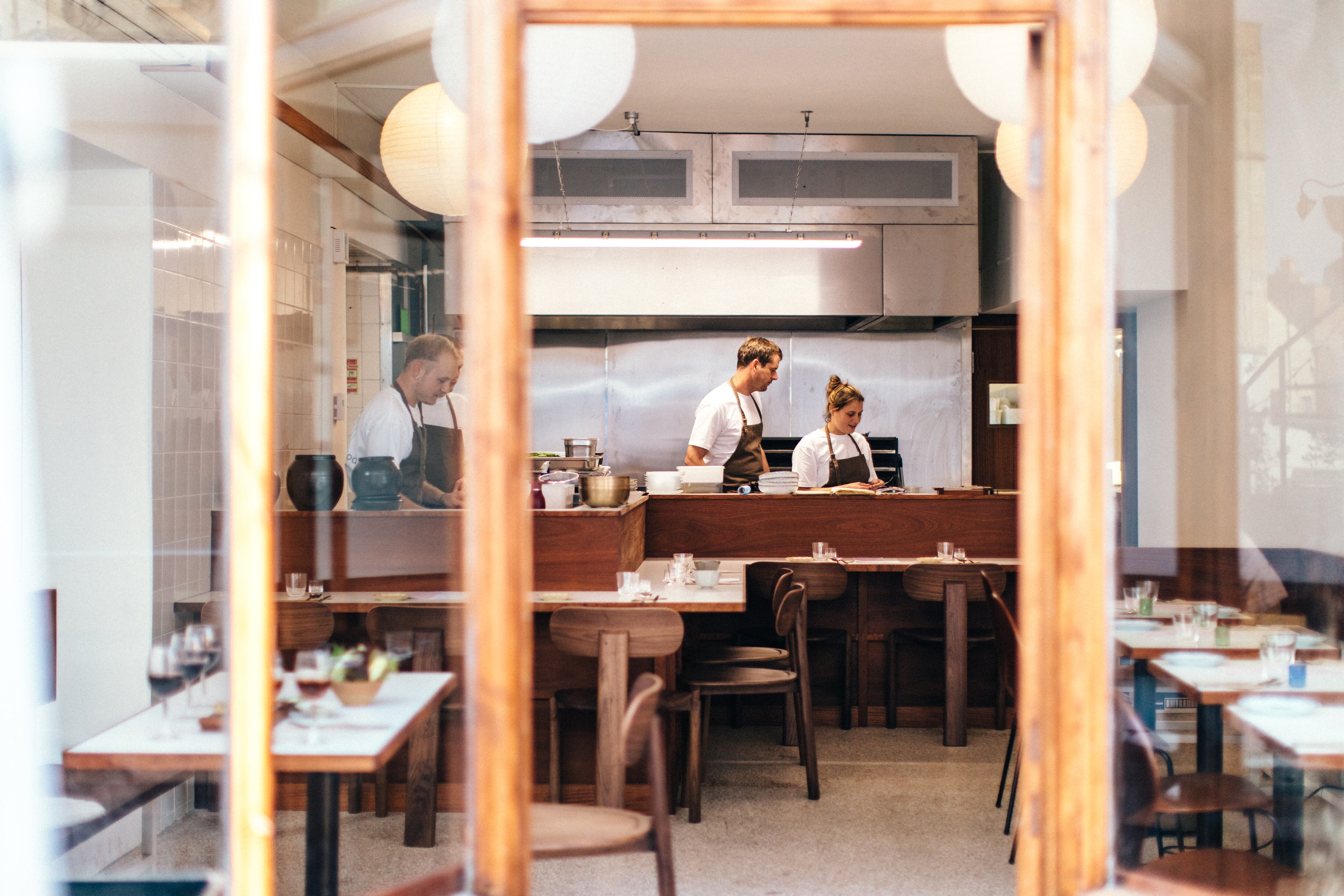 Interior shot of Dongnae with chefs in the background