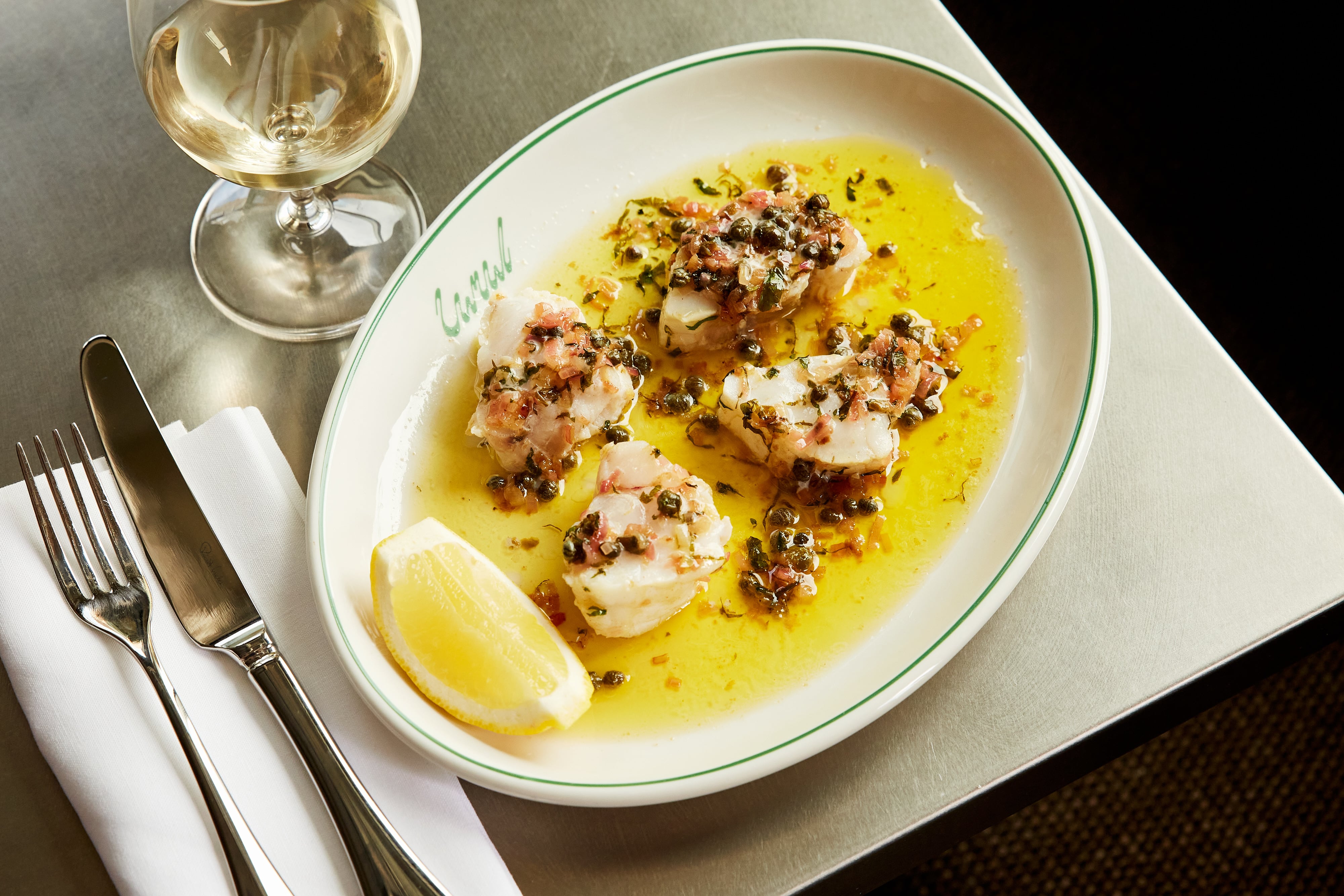 Monkfish, datterini tomatoes, capers at Canal restaurant