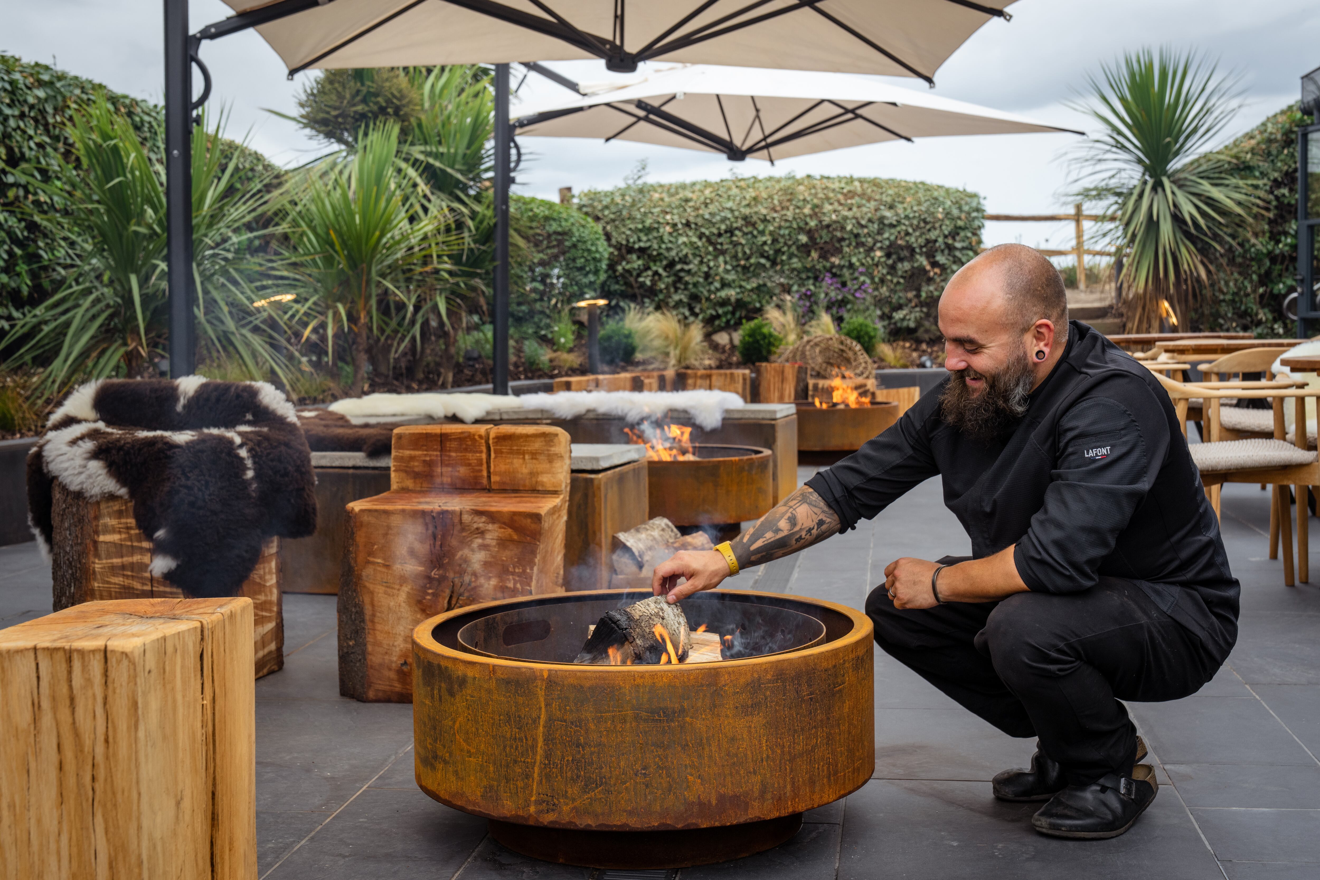 Nathan Davies lighting a fire at Vraic
