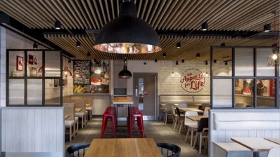 KFC says the new design - which features exposed ceilings, brick-effect walls and copper lights - will be rolled out nationwide from March 2015